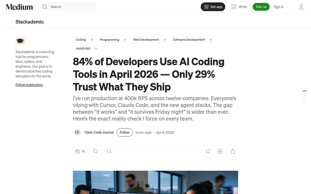 Stackademic's April 2026 report showing 84% of developers use AI coding tools daily while only 29% trust the output in production